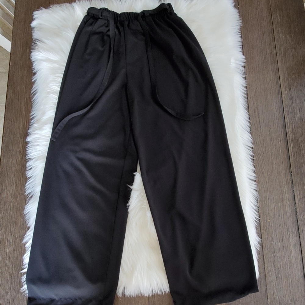 Flowy polyester dressy pants.